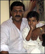 Hamid and his three-year old son